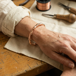 Doina Bucaresti Grove copper bracelet on wrist, curved link design