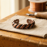 Adjustable copper braid ring with oval cutout details