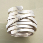 Vintage silver stack ring with multiple polished bands and a twisted center detail