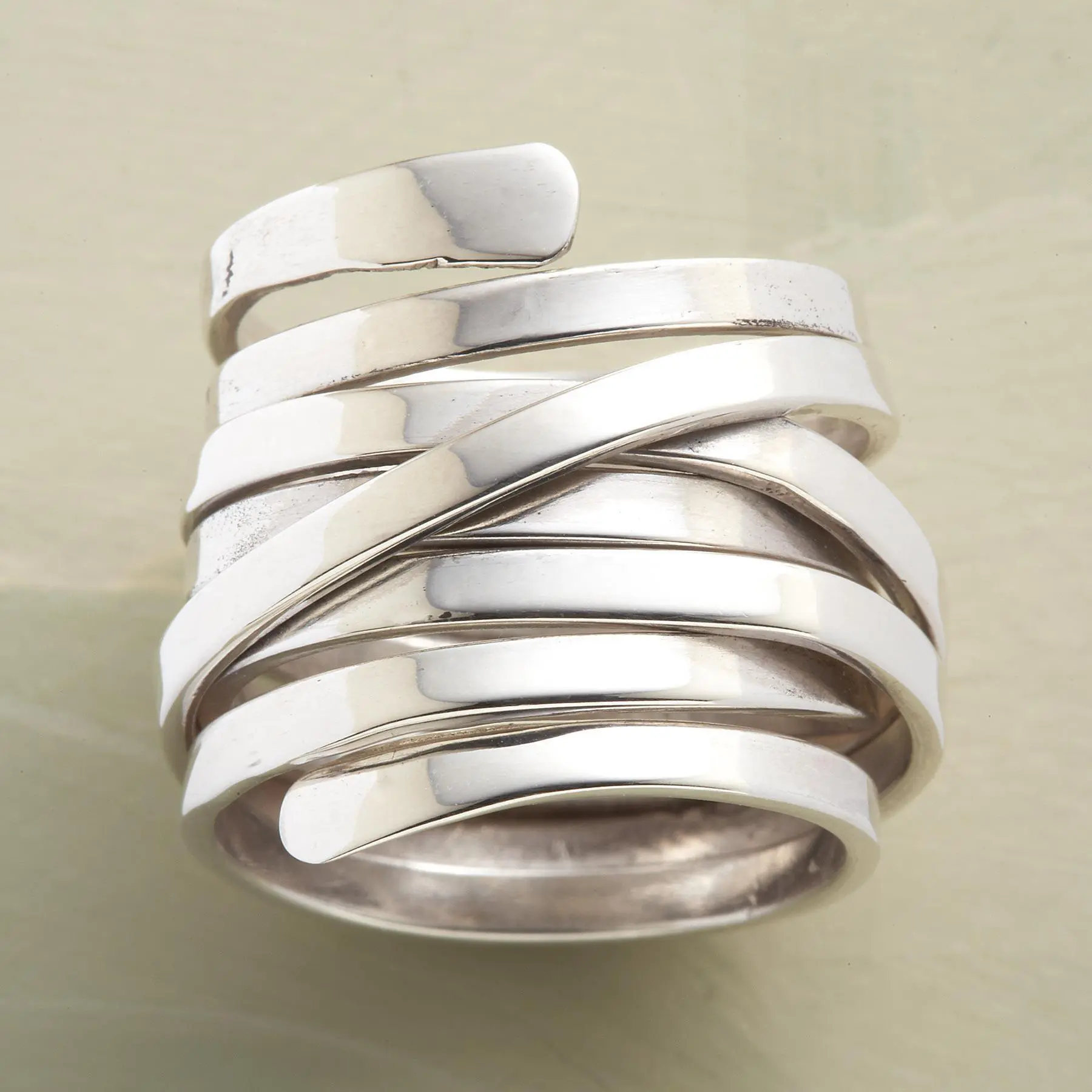 Vintage silver stack ring with multiple polished bands and a twisted center detail