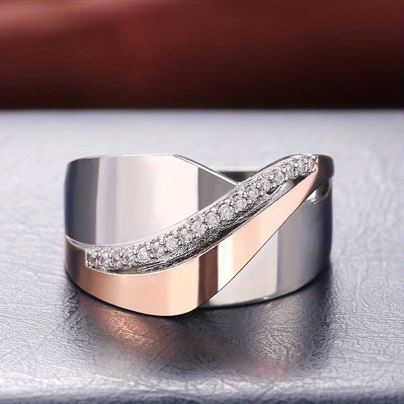 Rose gold ring with wave band and pavé stones