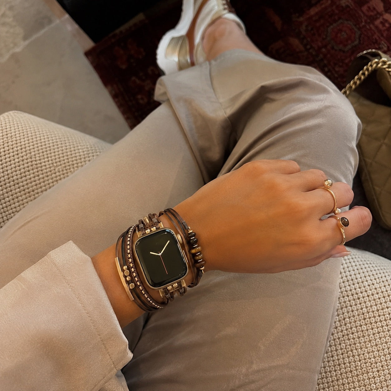 Women's multi-strand watch bracelet with black square watch and layered green stone accents