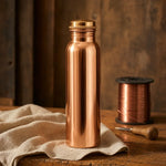 Copper water bottle with screw cap, metallic 950 ml