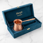 Hammered copper Turkish coffee pot inside blue gift box
