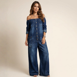 Off-shoulder denim jumpsuit in deep blue with vertical button placket, wide-leg trousers