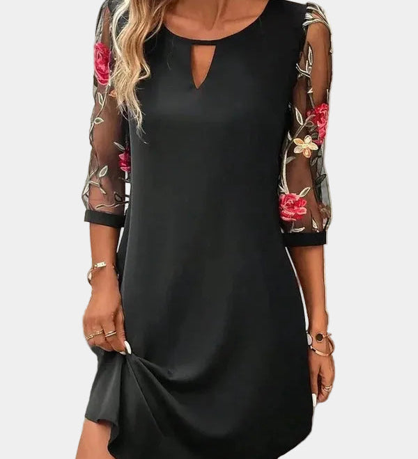 Black summer shift dress with cutout neckline and sheer floral embroidered sleeves