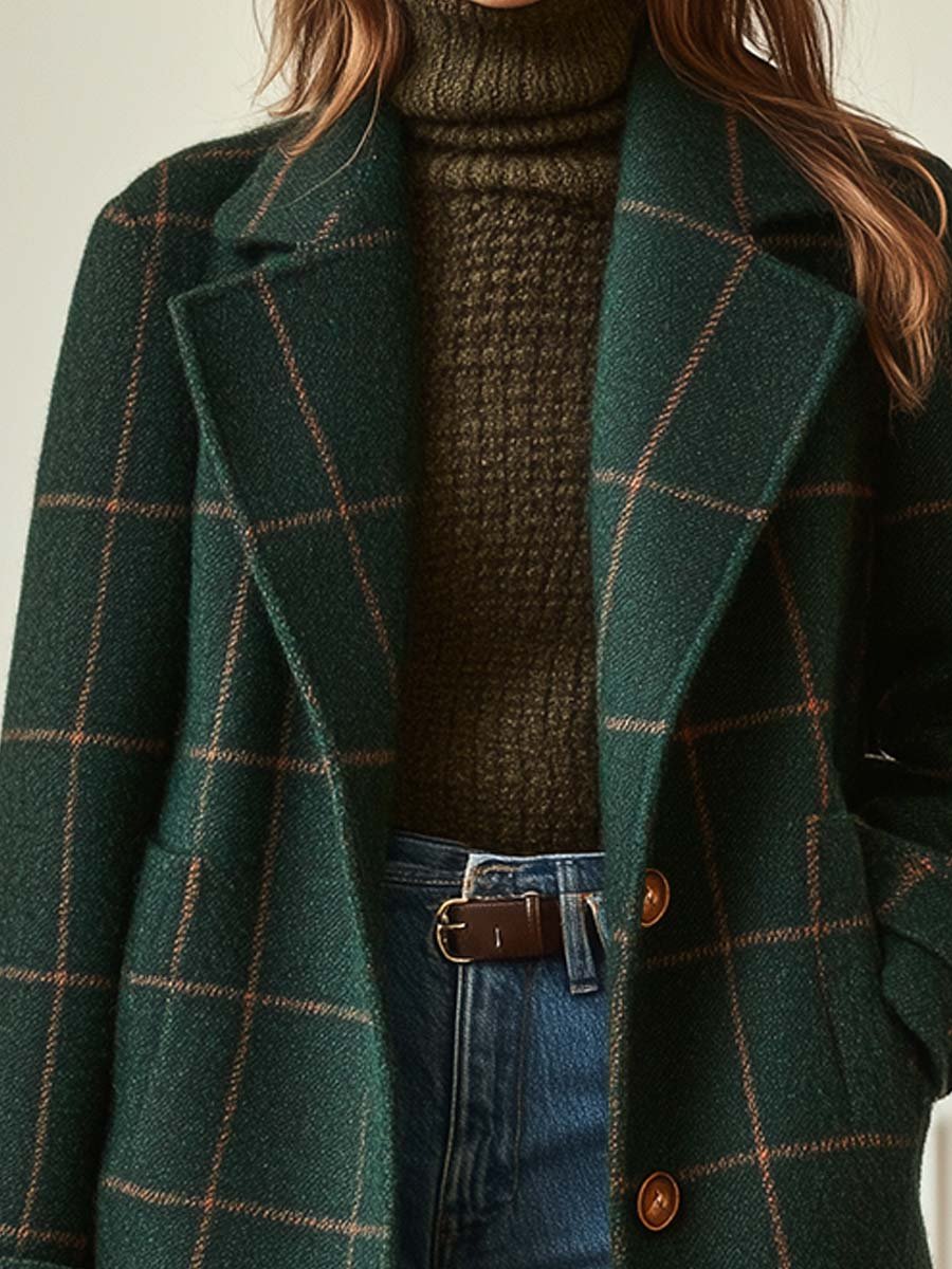 Dark green plaid tweed coat with notch lapels and brown button detail