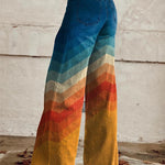 Boho wide-leg pants in dark denim with multicolor chevron side stripe