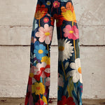 High-waist wide-leg floral pants in dark base with bright flower print
