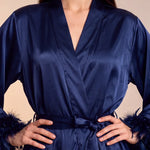 Celiana satin kimono robe close-up, V-neck, tie belt, feather-trim cuffs, dark navy