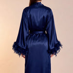Celiana long satin kimono robe back view, tie belt, feather-trimmed cuffs, dark navy