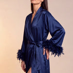 Celiana long satin kimono robe side view, dark navy satin, tie belt, feather-trim cuffs