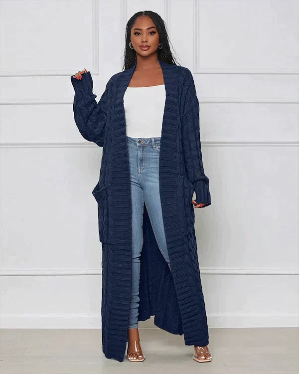 Navy long knit cardigan with open front and textured vertical ribbed pattern