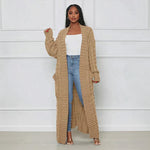 Beige long knit cardigan with open front and textured vertical ribbed pattern