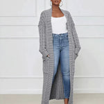 Gray long knit cardigan with open front and textured vertical ribbed pattern