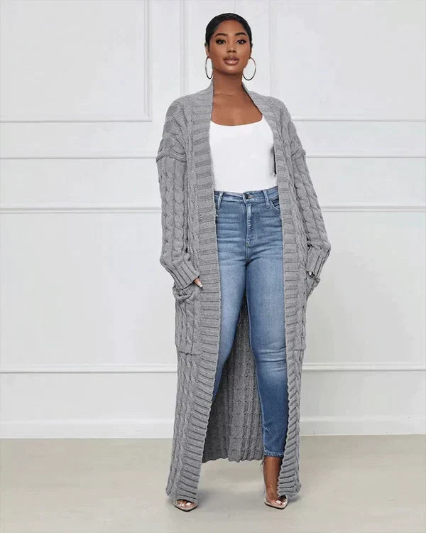 Gray long knit cardigan with open front and textured vertical ribbed pattern