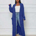 Blue long knit cardigan with open front and textured vertical ribbed pattern
