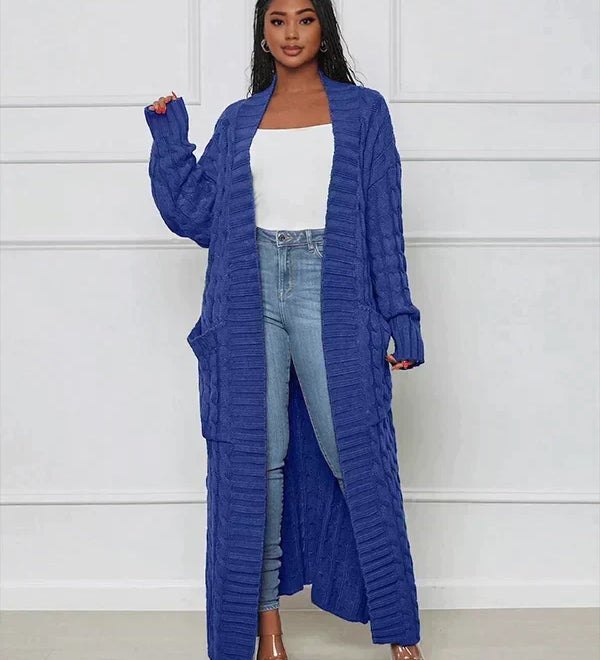 Blue long knit cardigan with open front and textured vertical ribbed pattern