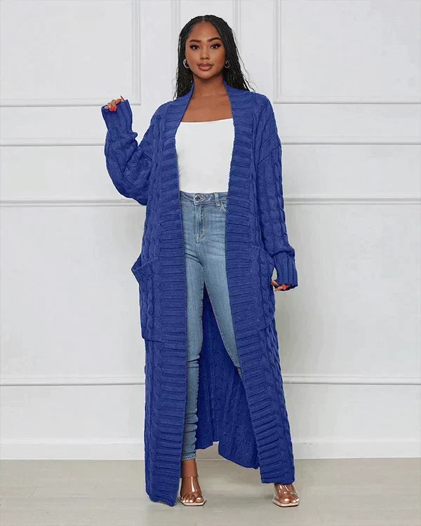 Blue long knit cardigan with open front and textured vertical ribbed pattern