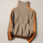 High-neck chevron sweater flat lay with orange trim and ribbed hem, long sleeves