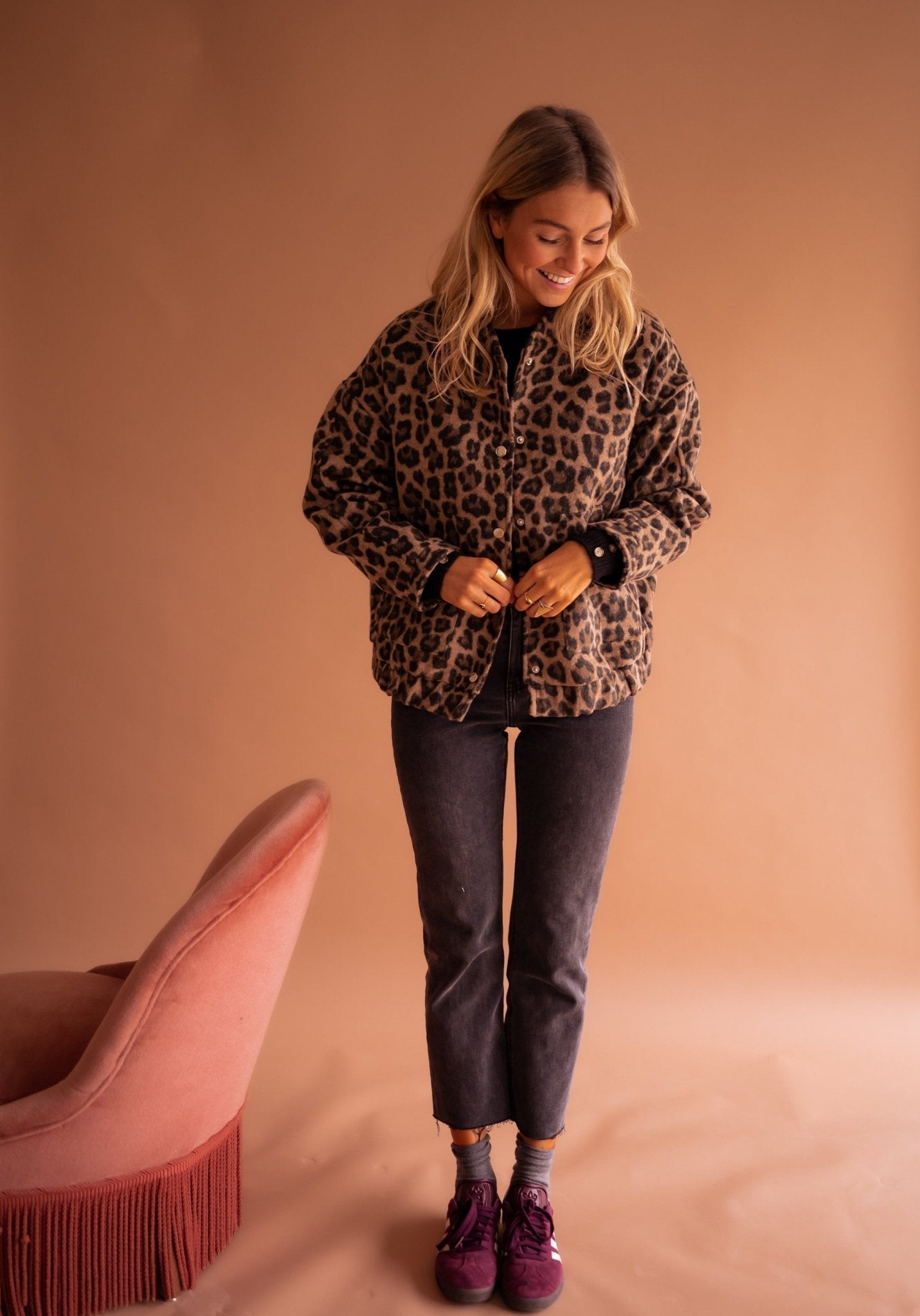 Leopard-print button-front jacket with long sleeves and chest pockets