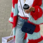 Striped fuzzy long cardigan with red and light blue bands and open-front design