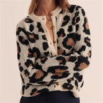 Leopard print knit cardigan sweater with button front, cream base and dark spotted pattern