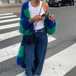 Oversized long striped cardigan in green, blue, and dark blue with fuzzy open front