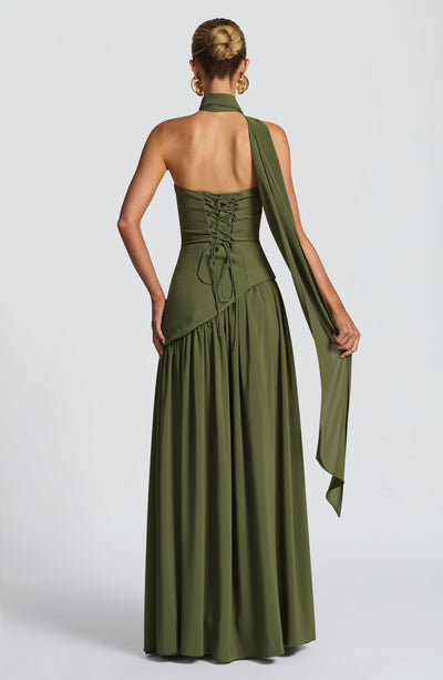 Women’s maxi dress in olive green with corset-style back lace-up and flowing skirt.