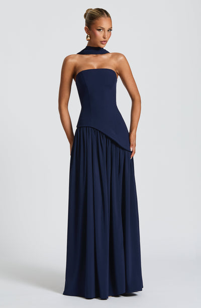 Women’s strapless dark navy maxi dress with gathered waist and flowing skirt