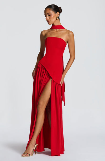 Women’s strapless red maxi dress with high slit and draped ruffle detail