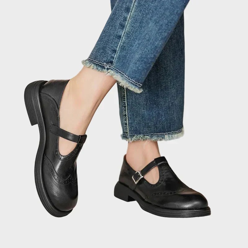 Women's black leather Mary Jane shoes with ankle strap and buckle, chunky sole