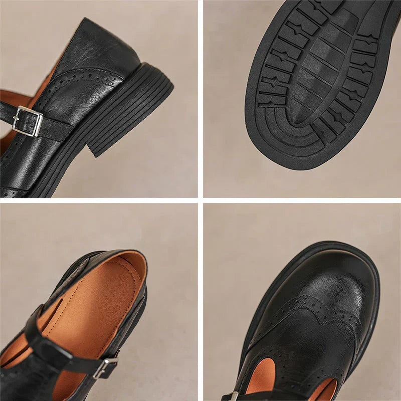 Black leather Mary Jane shoes detail: buckle strap and ridged rubber sole tread