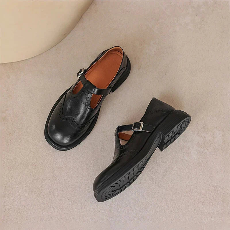 Women's black leather Mary Jane shoes with top strap, buckle closure, thick sole
