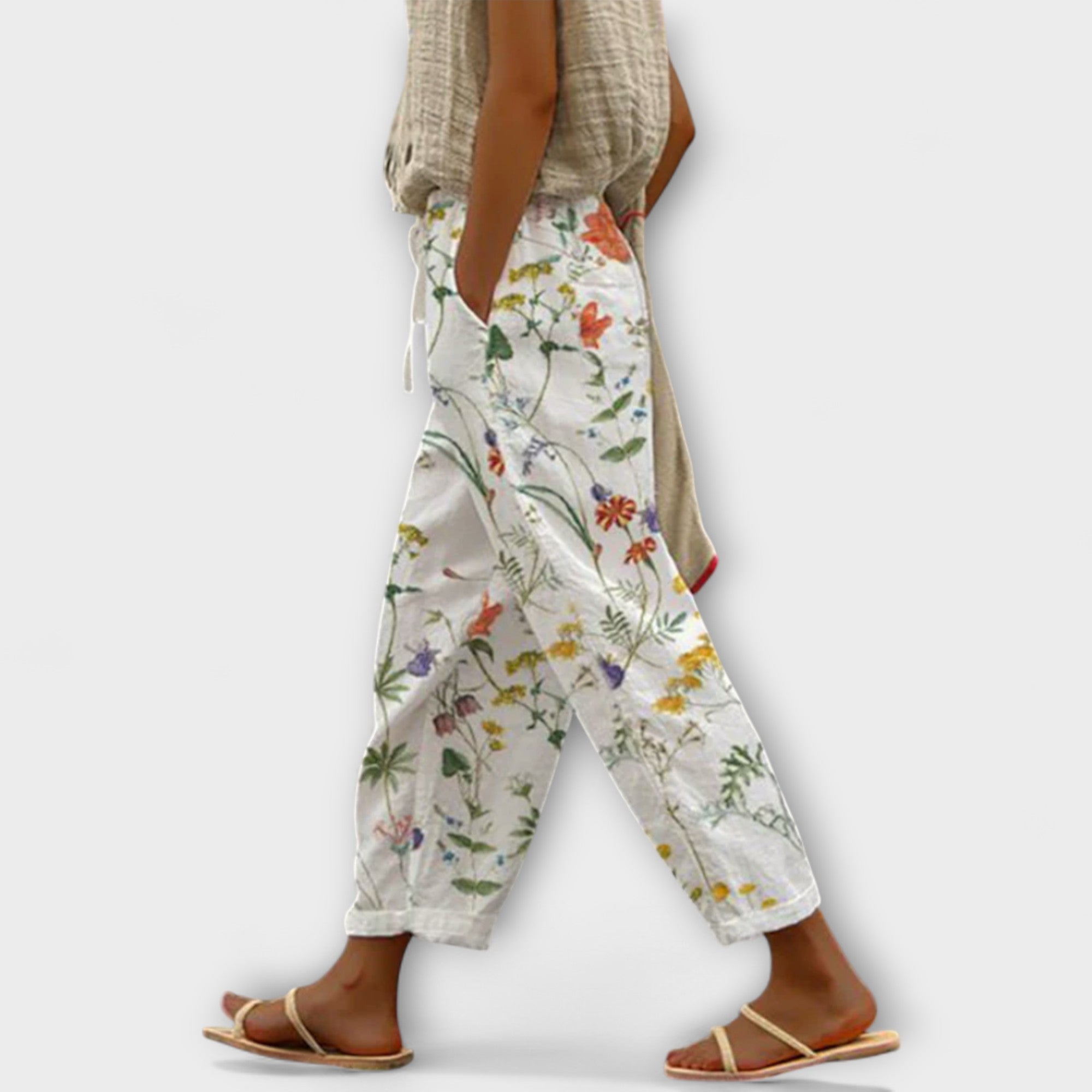 Wide-leg botanical floral printed pants on off-white, gathered elastic waist