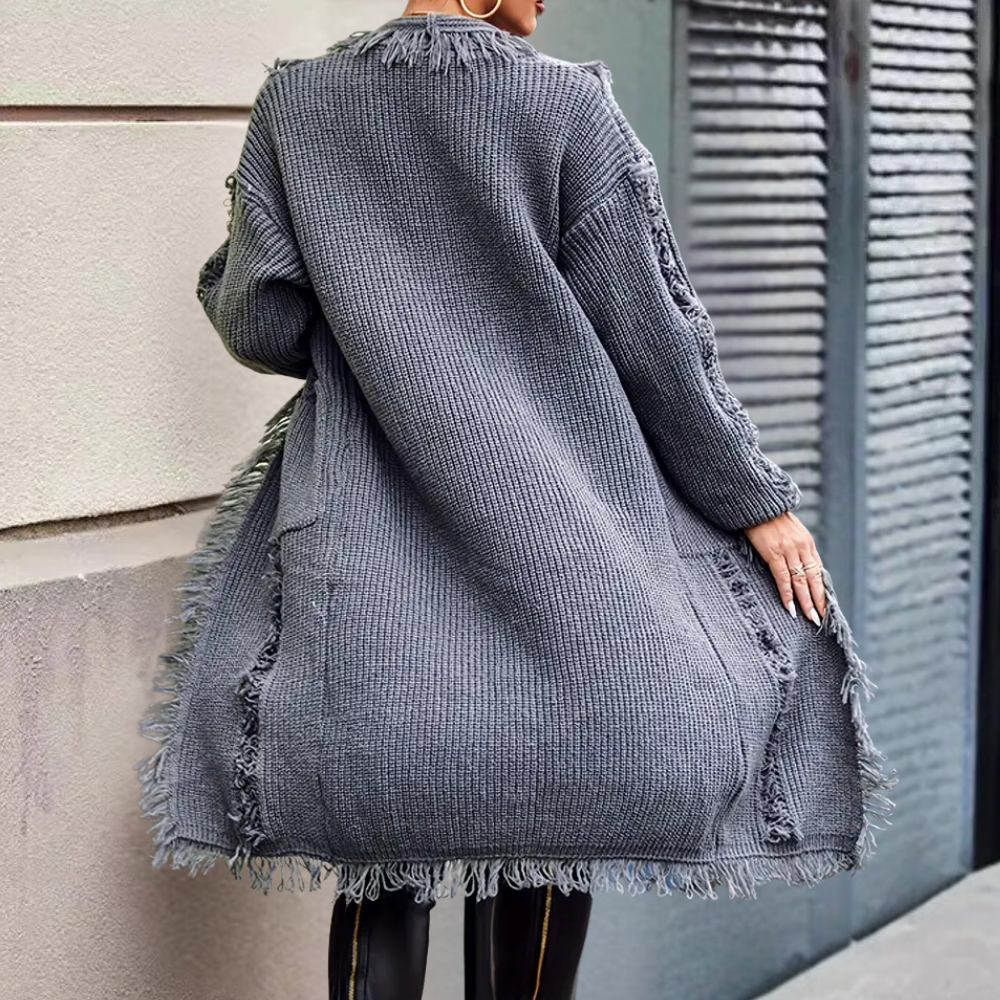 Gray knit cardigan back view with long sleeves and fringe trim along the hem