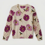 Cream knit floral pullover sweater with violet flowers and crochet-knit sleeve panels