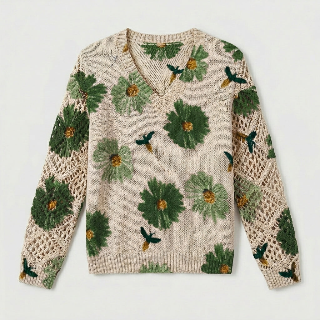 Cream knit floral pullover sweater with green flowers and crochet-knit sleeve panels