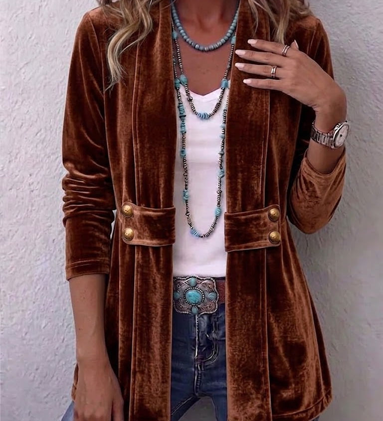 Velvet open-front long-sleeve jacket, dark brown with gold snap buttons and flap pockets.