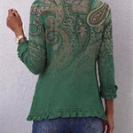 Women's green button jacket with paisley print on back, ruffled hem and cuffs