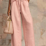 Pink wide-leg linen-look pants with drawstring waist and side pockets, paired set