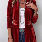Velvet open-front long-sleeve jacket, red with gold snap buttons and flap pockets.