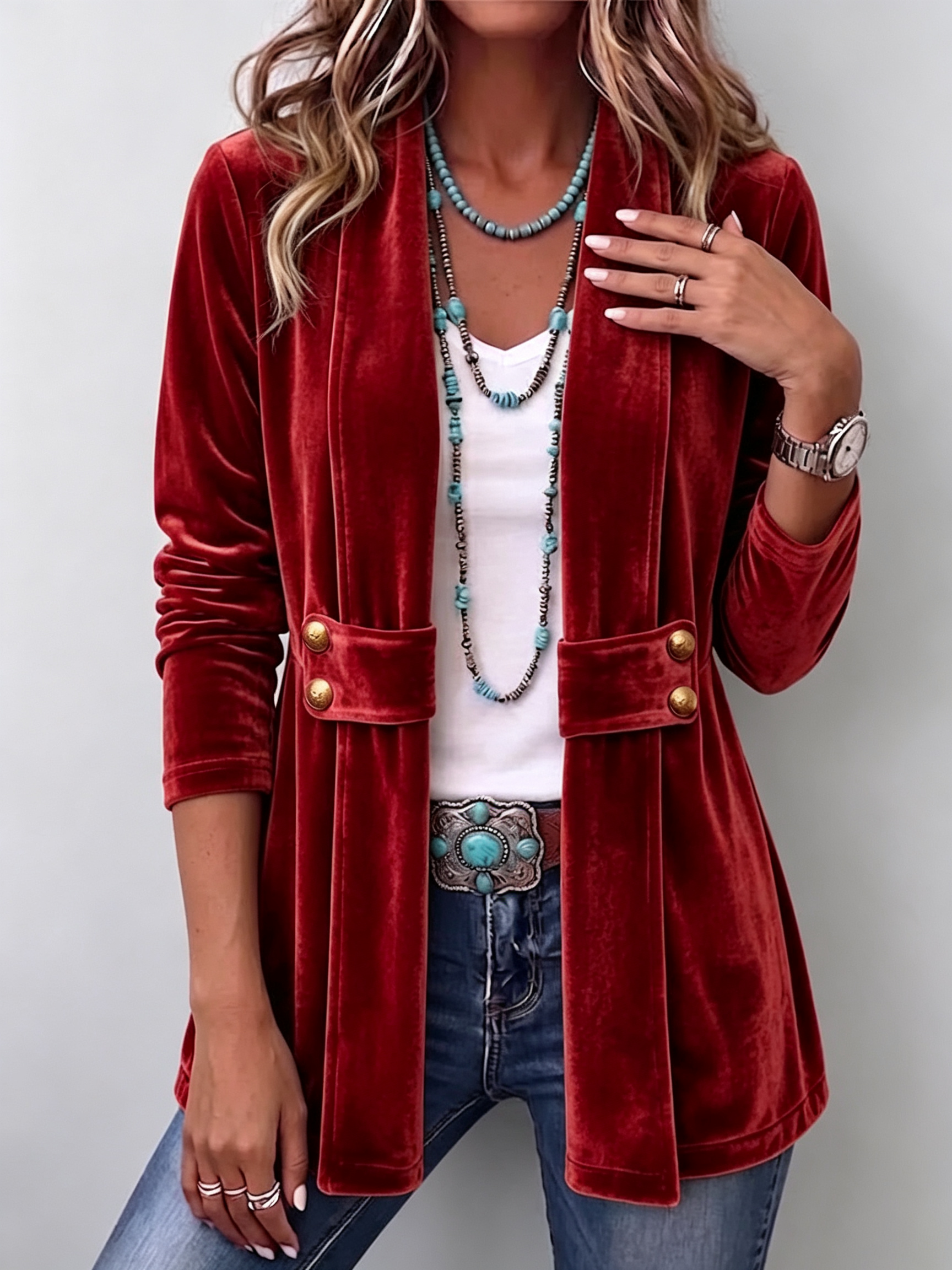 Velvet open-front long-sleeve jacket, red with gold snap buttons and flap pockets.
