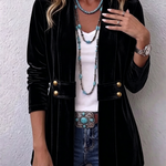 Velvet open-front long-sleeve jacket, black with gold snap buttons and flap pockets.