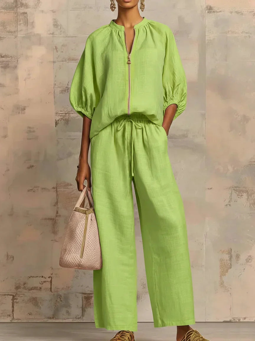 Light green two-piece blouse and wide-leg pants set, balloon sleeves and drawstring waist