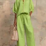 Light green two-piece blouse and wide-leg pants set, balloon sleeves and drawstring waist