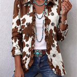 Brown cow-print denim jacket with button front and long sleeves