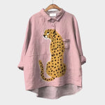 Button-up blouse in dusty pink with collar and long sleeves, animal graphic front