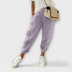 Comfort striped pants in purple with light vertical pinstripes, cuffed hems