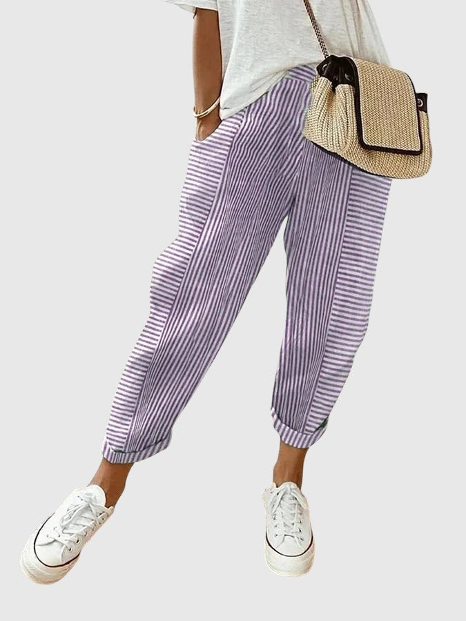 Nina pinstriped trousers in violet and white with ankle cuffs